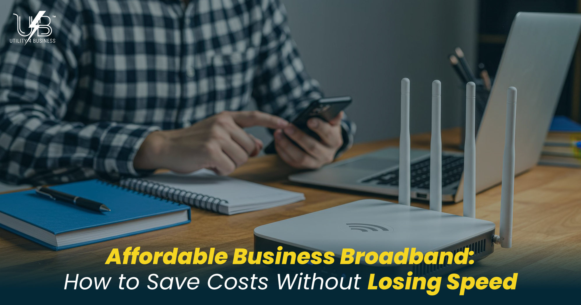 Affordable business broadband by utility4business save costs without losing speed; office router, laptop and phone on desk